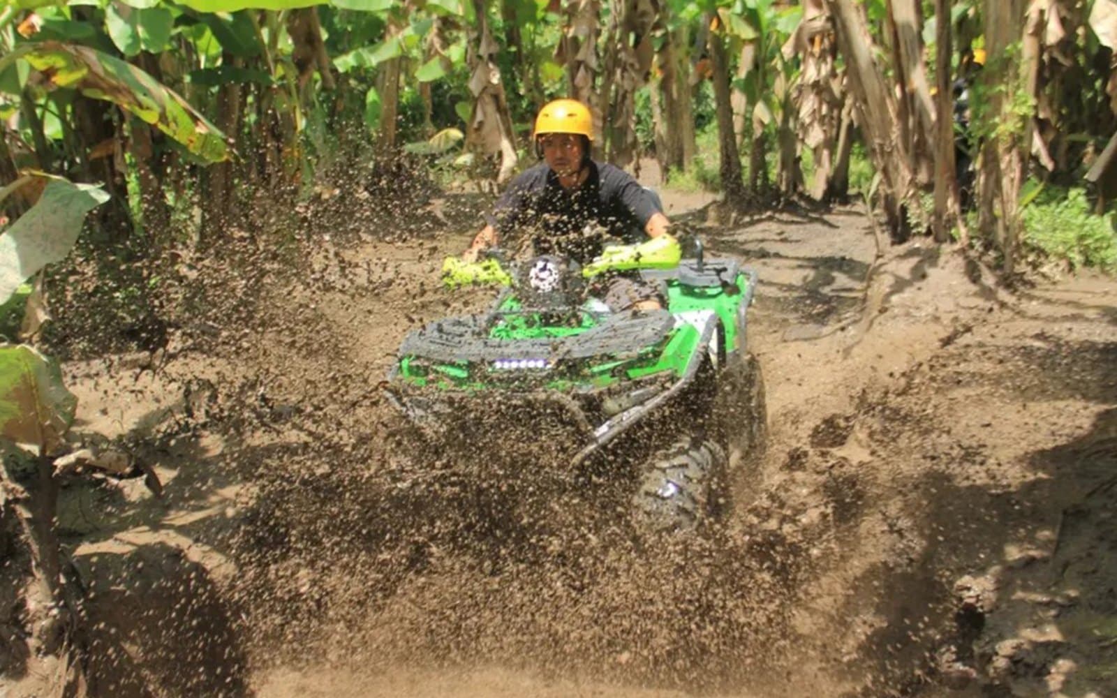 Blasting through deep water channels surrounded by lush green rainforest walls.